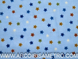 PRINTED FLANNEL WITH STARS ON A BLUE BACKGROUND