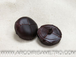 Leather button with foot