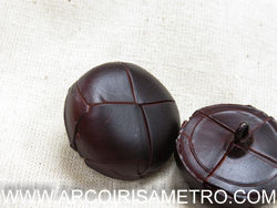 Leather button with foot