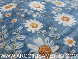 DAISY ON DENIM BACKGROUND