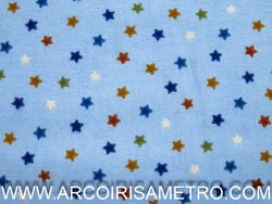 PRINTED FLANNEL WITH STARS ON A BLUE BACKGROUND