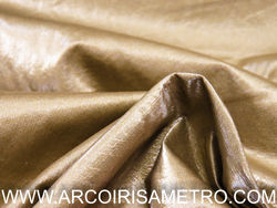 Tecido dourado escuro