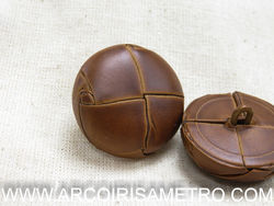 Leather button with foot